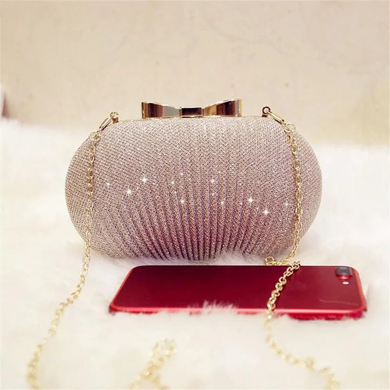 Women Shiny Gold Metal Bow Clutch Bag