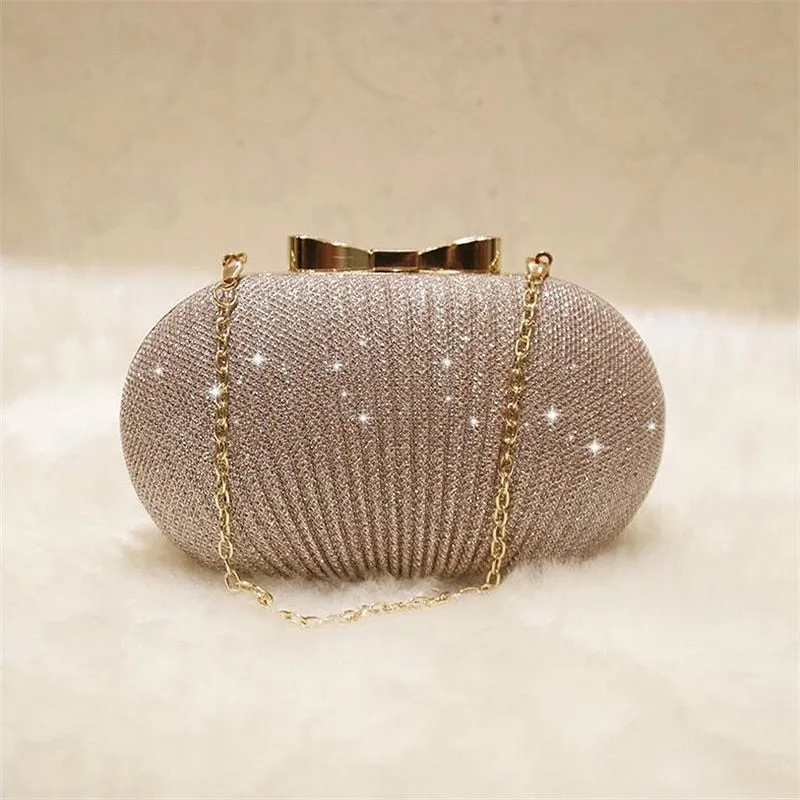 Women Shiny Gold Metal Bow Clutch Bag